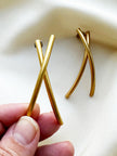 Lange gouden oorstekers