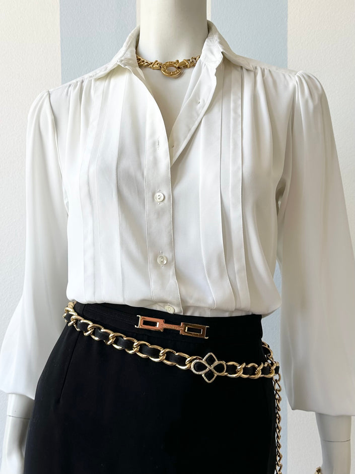 Witte blouse met plooien