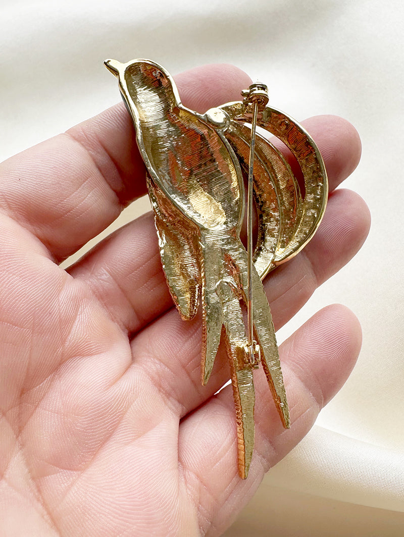 Grote geëmailleerde vogelbroche