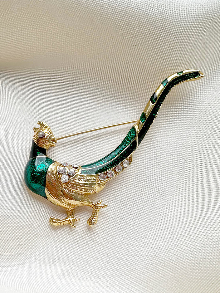 Geëmailleerde vogelbroche