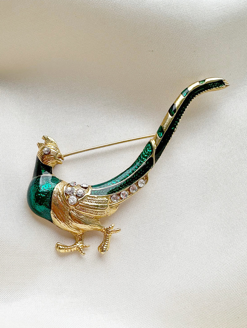 Geëmailleerde vogelbroche