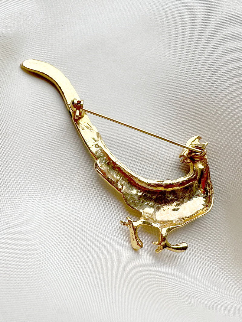 Geëmailleerde vogelbroche