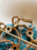 Designer broche/kettinghanger met vergeetmenietjes