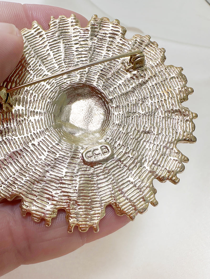 Sunburst broche