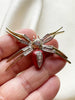 Spin broche
