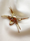 Spin broche