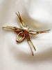 Spin broche