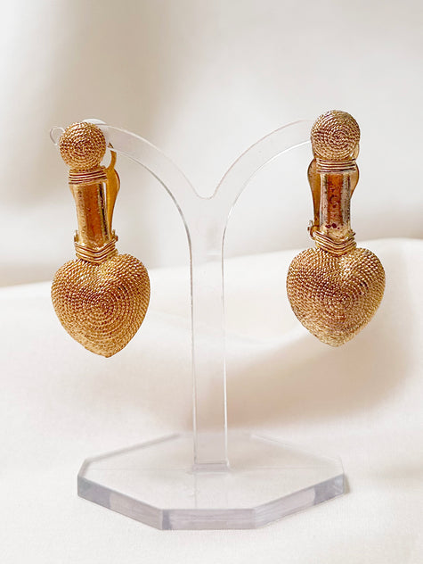 Gouden hartjes clip oorbellen