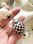 Ketting met faux parels en parelmoer