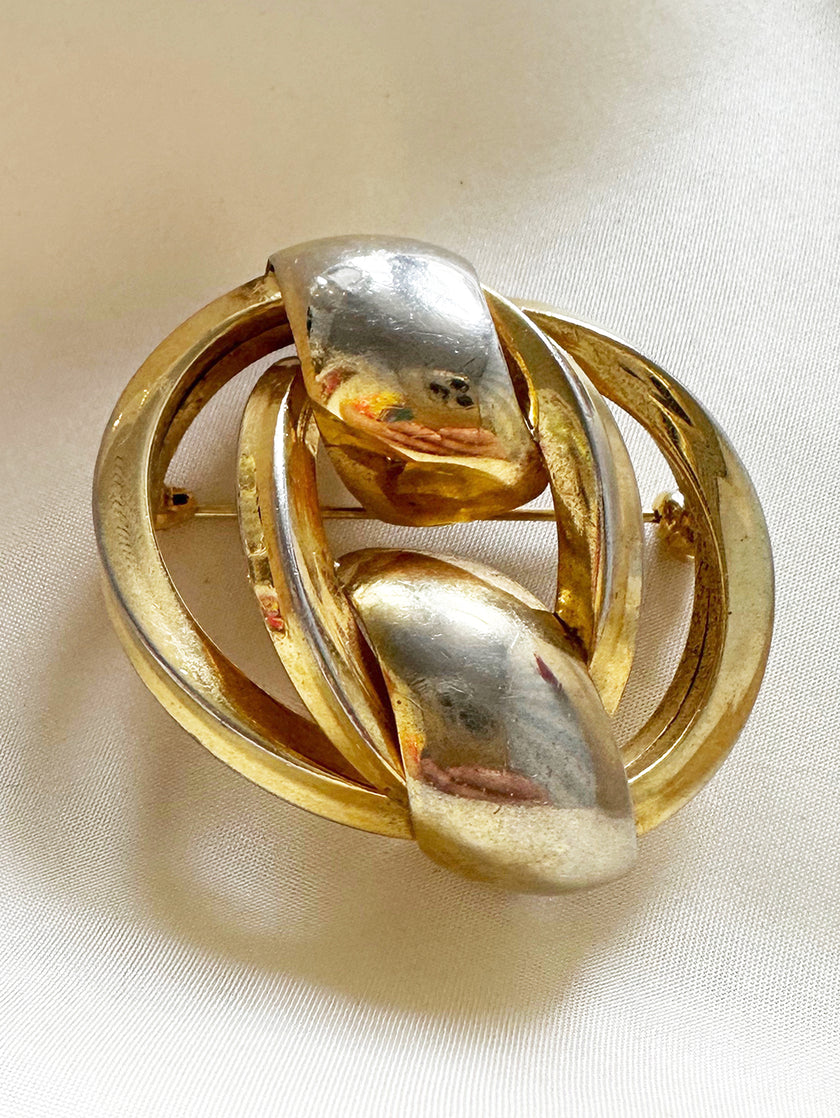 Vergulde designer broche