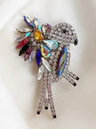 Kristalglazen vogel broche