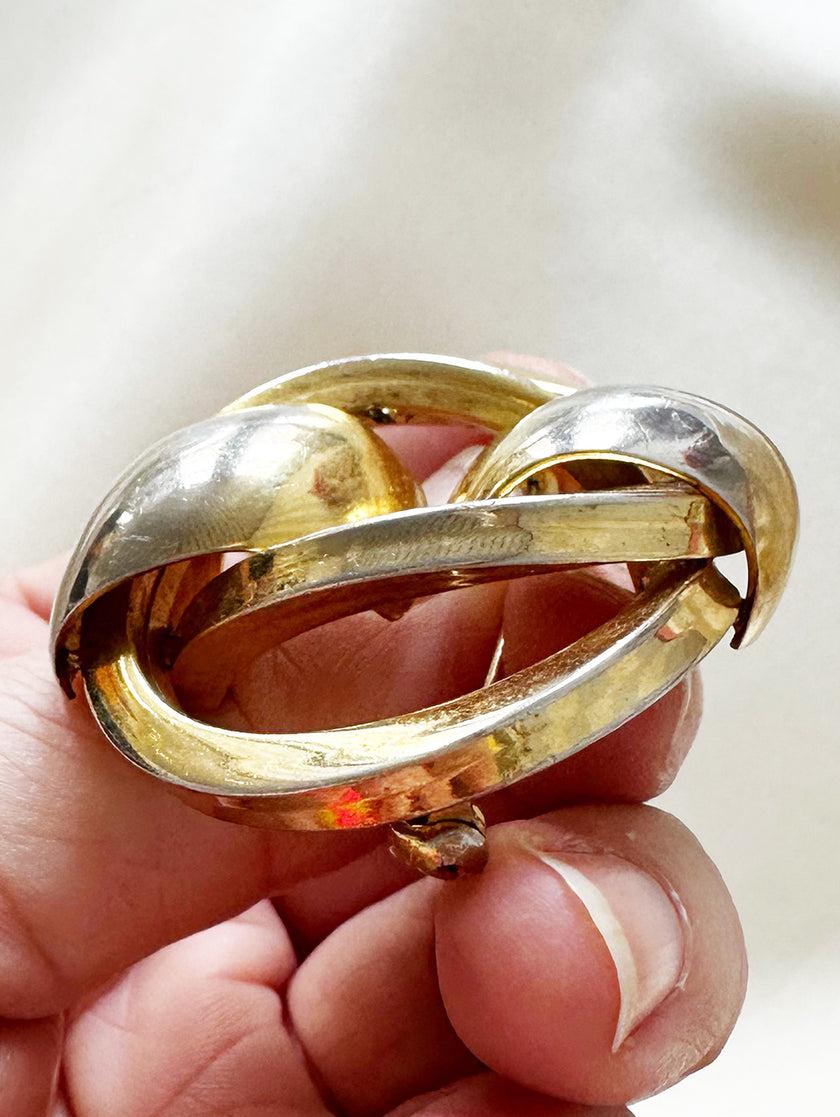 Vergulde designer broche