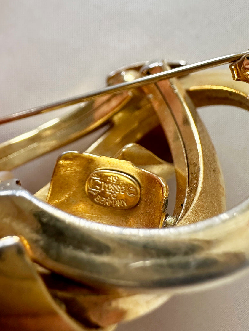 Vergulde designer broche