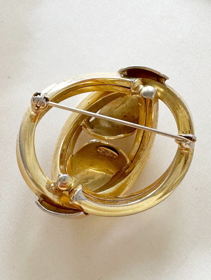 Vergulde designer broche