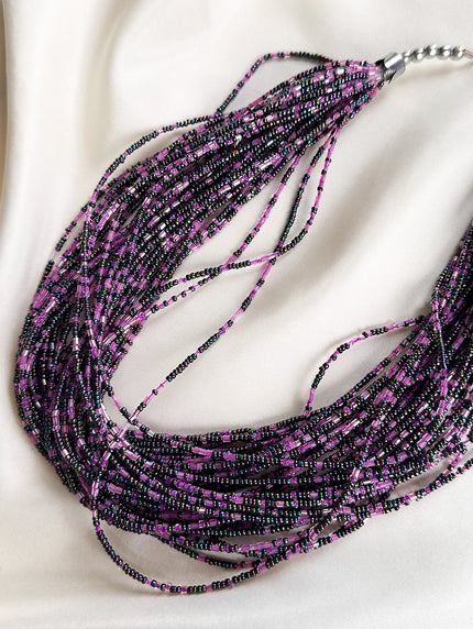 Gelaagde ketting met kleine glaskraaltjes