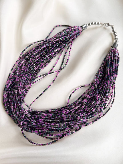 Gelaagde ketting met kleine glaskraaltjes