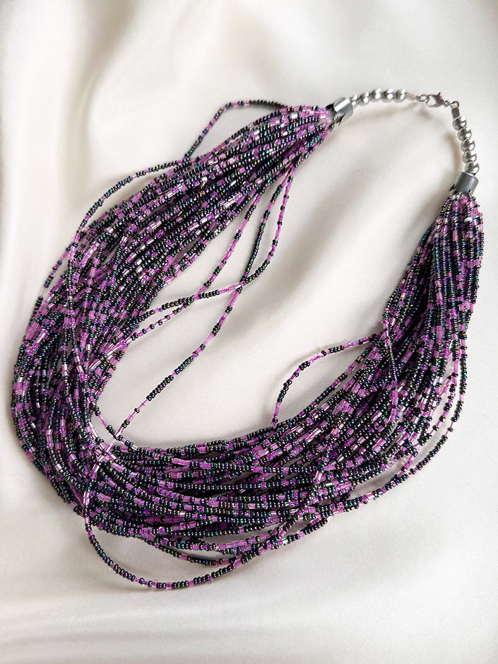 Gelaagde ketting met kleine glaskraaltjes