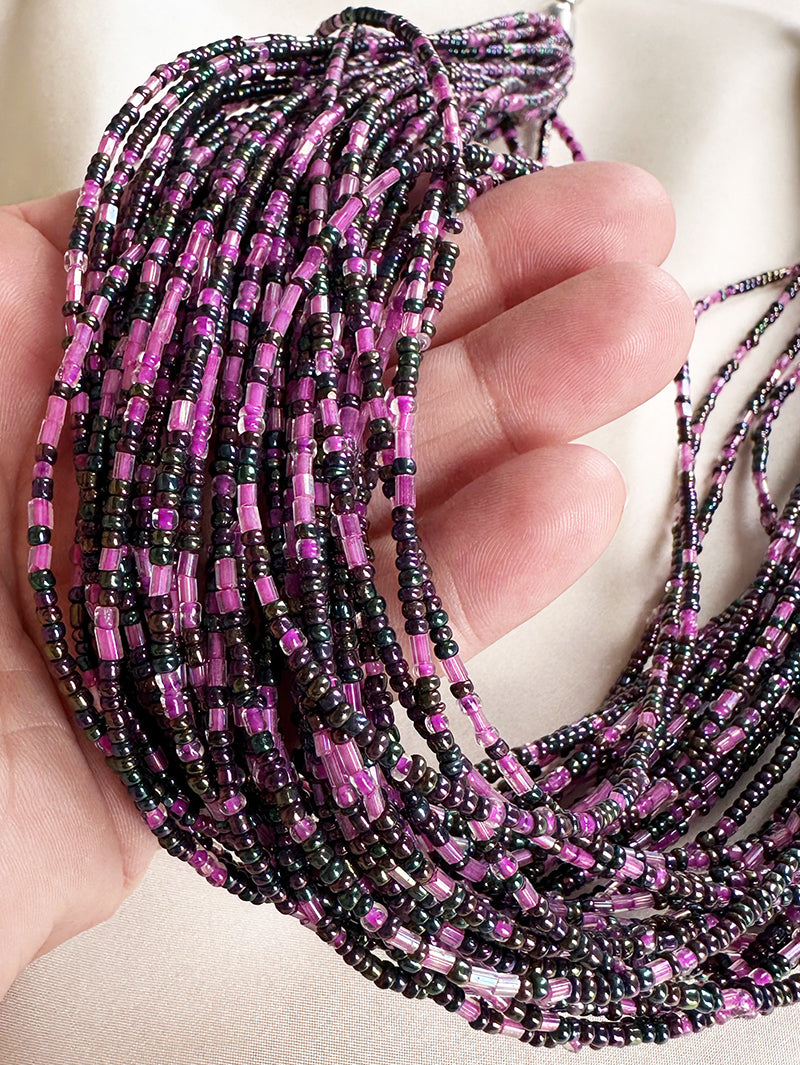 Gelaagde ketting met kleine glaskraaltjes
