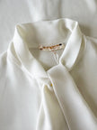 Off-white strikblouse