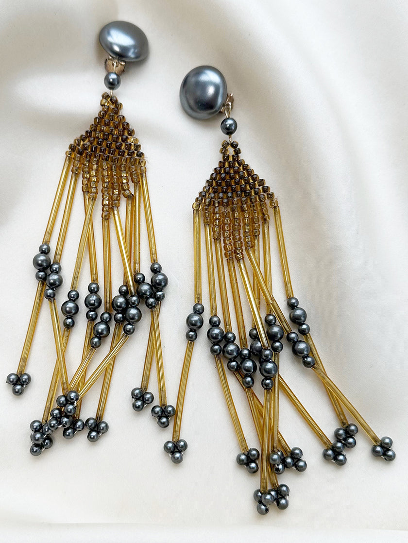 Lange vintage oorclips met kraaltjes