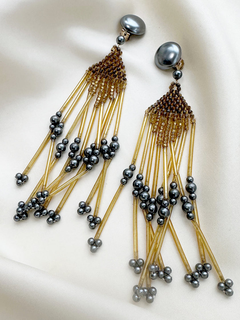 Lange vintage oorclips met kraaltjes