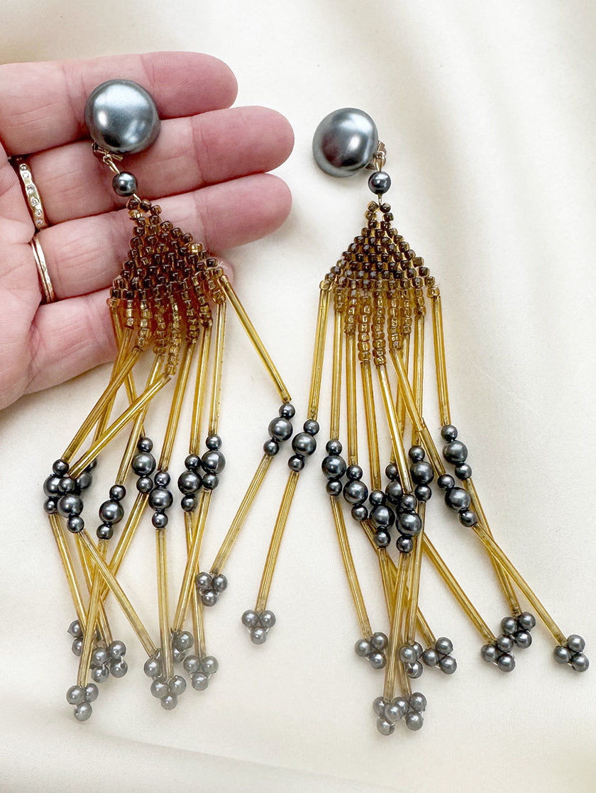 Lange vintage oorclips met kraaltjes