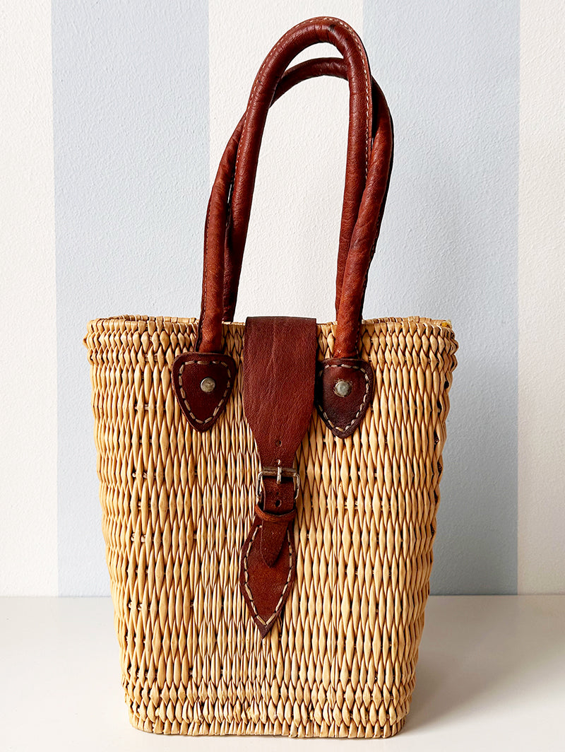 Rieten handtas met leren details