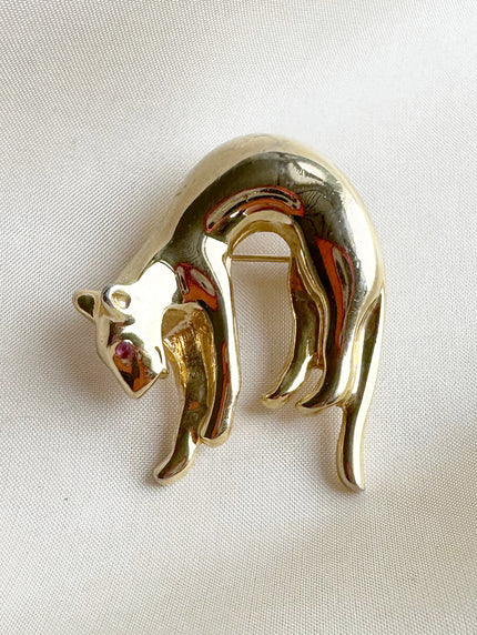 Gouden luipaard broche