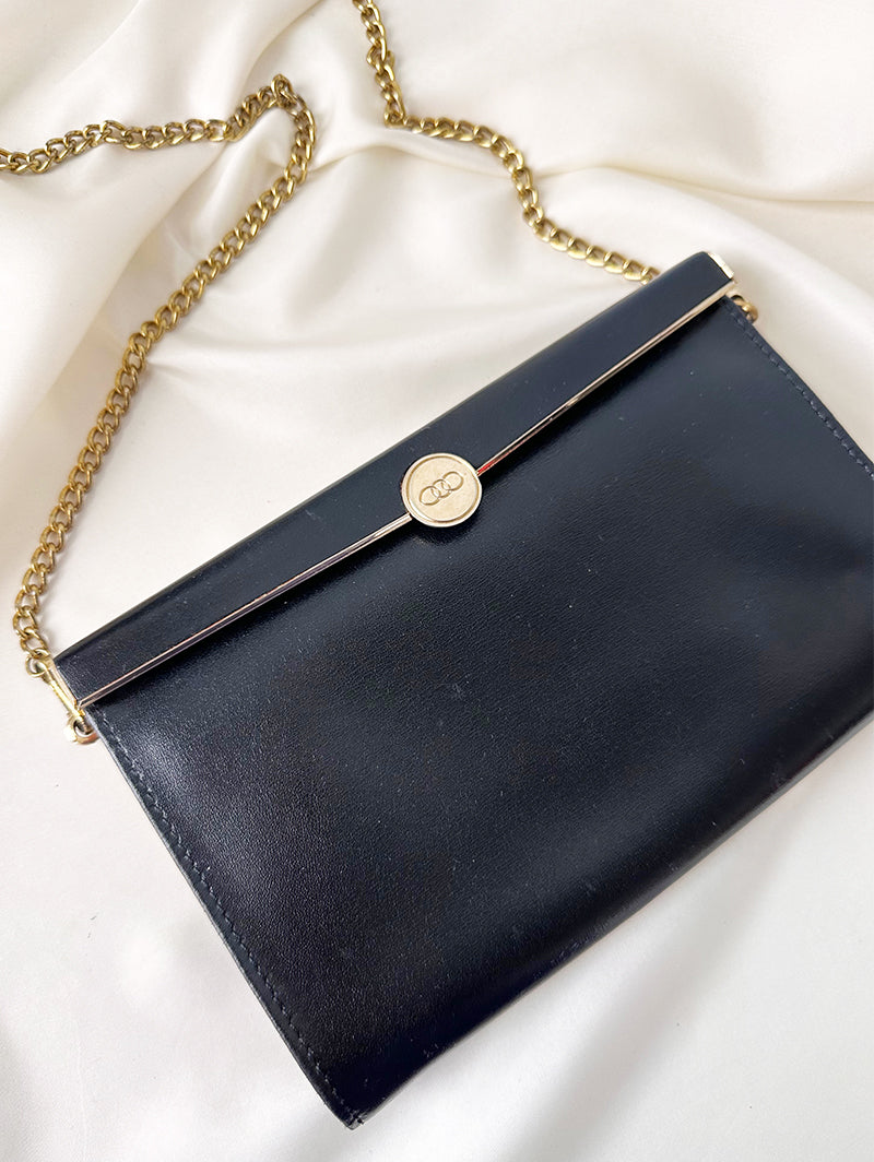 Zwart schoudertasje met gouden details