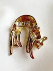 Gouden luipaard broche