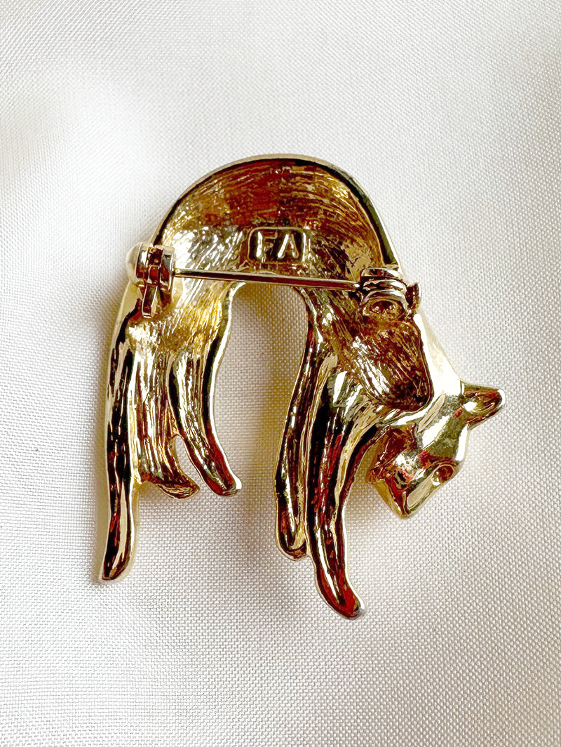 Gouden luipaard broche