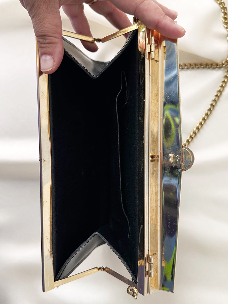 Zwart schoudertasje met gouden details
