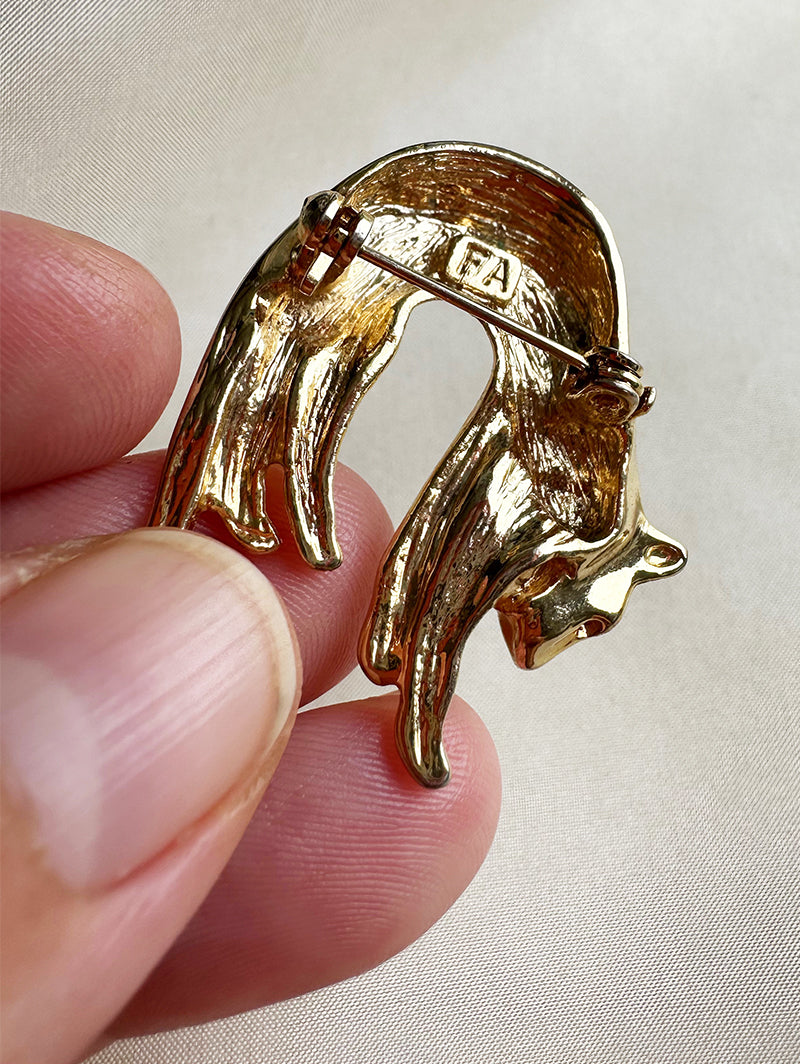 Gouden luipaard broche