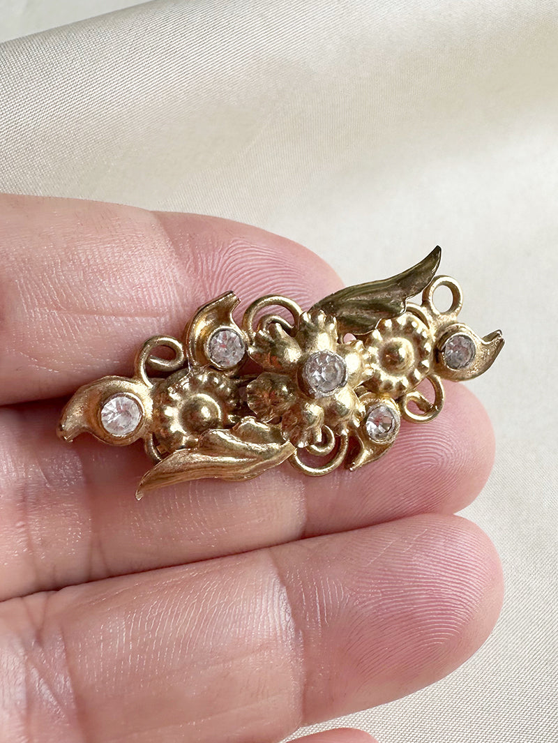 Gouden broche met strass