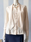 Crème strikblouse