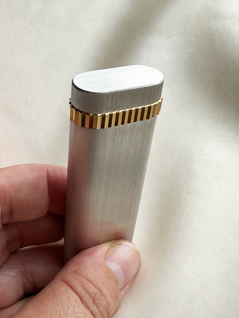 Goud met zilveren designer aansteker