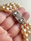 Triple parelketting avec art deco slotje