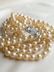 Triple parelketting avec art deco slotje