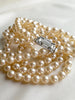 Triple parelketting avec art deco slotje