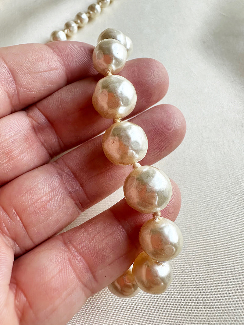 Faux parelketting met zilveren slotje