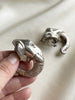 Verzilverde olifant clip oorbellen