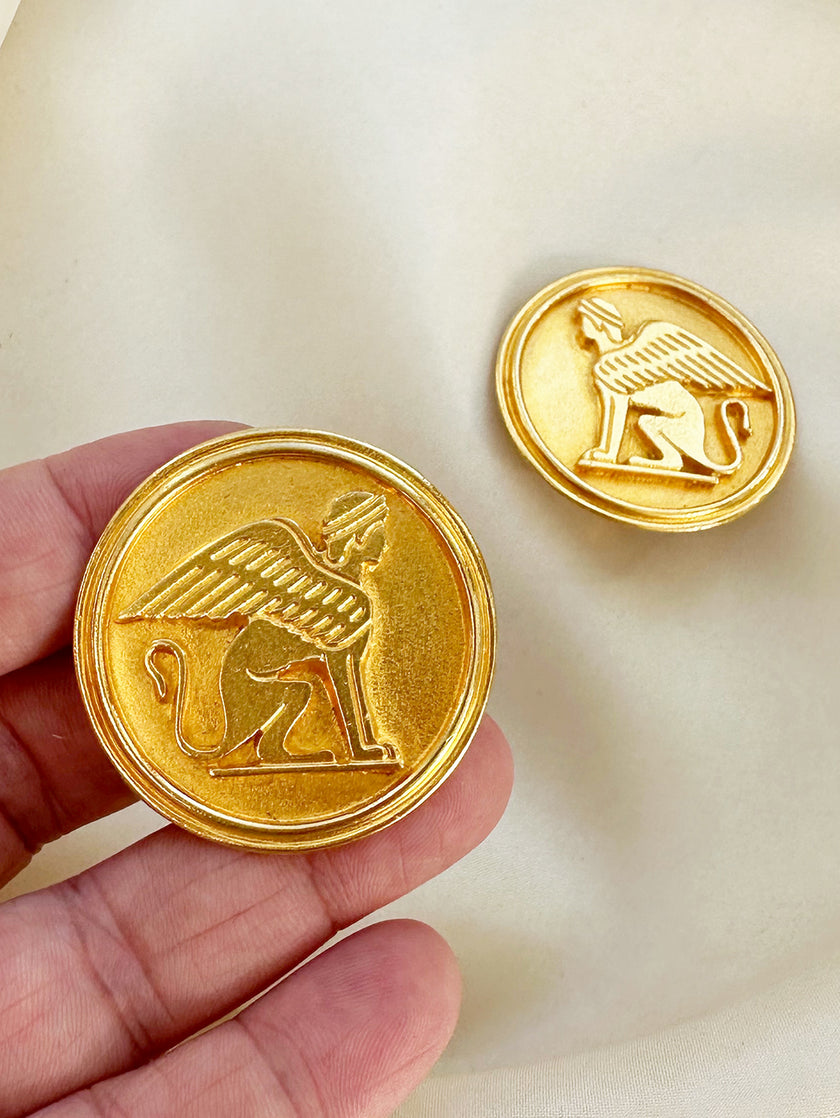 Vergulde sphinx clip oorbellen