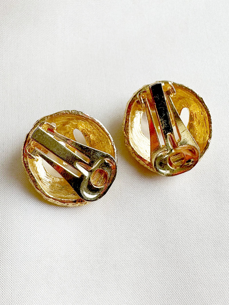 Gouden golfje clip oorbellen