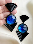 Zwart/blauwe statement oorbellen