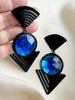 Zwart/blauwe statement oorbellen