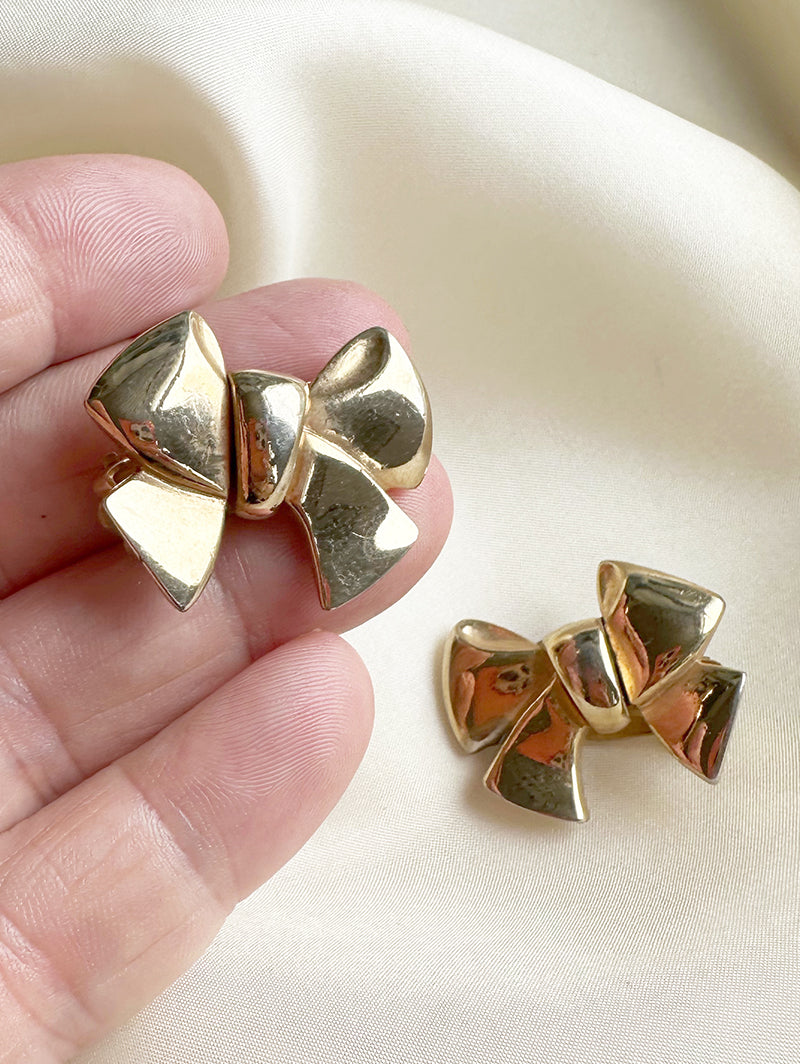 Gouden strikjes designer clip oorbellen