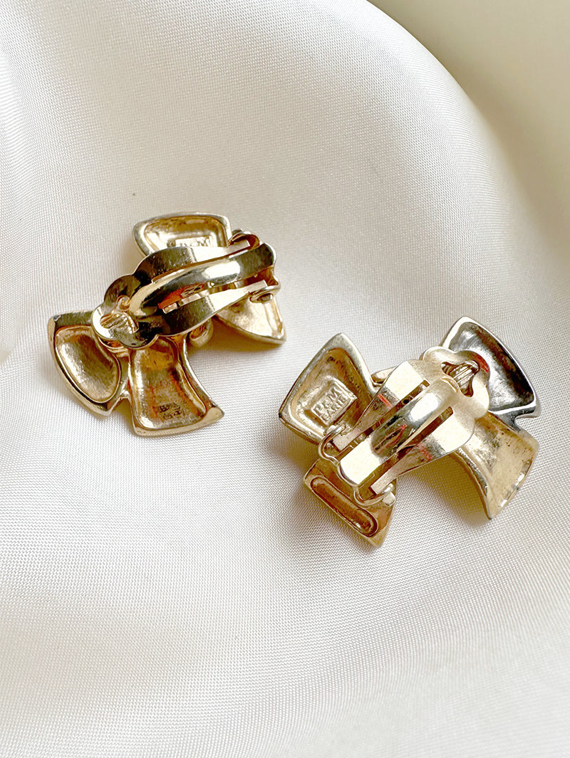 Gouden strikjes designer clip oorbellen