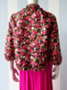 Floral jasje met roezelrandjes