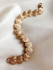 Gouden hartjes schakelarmband