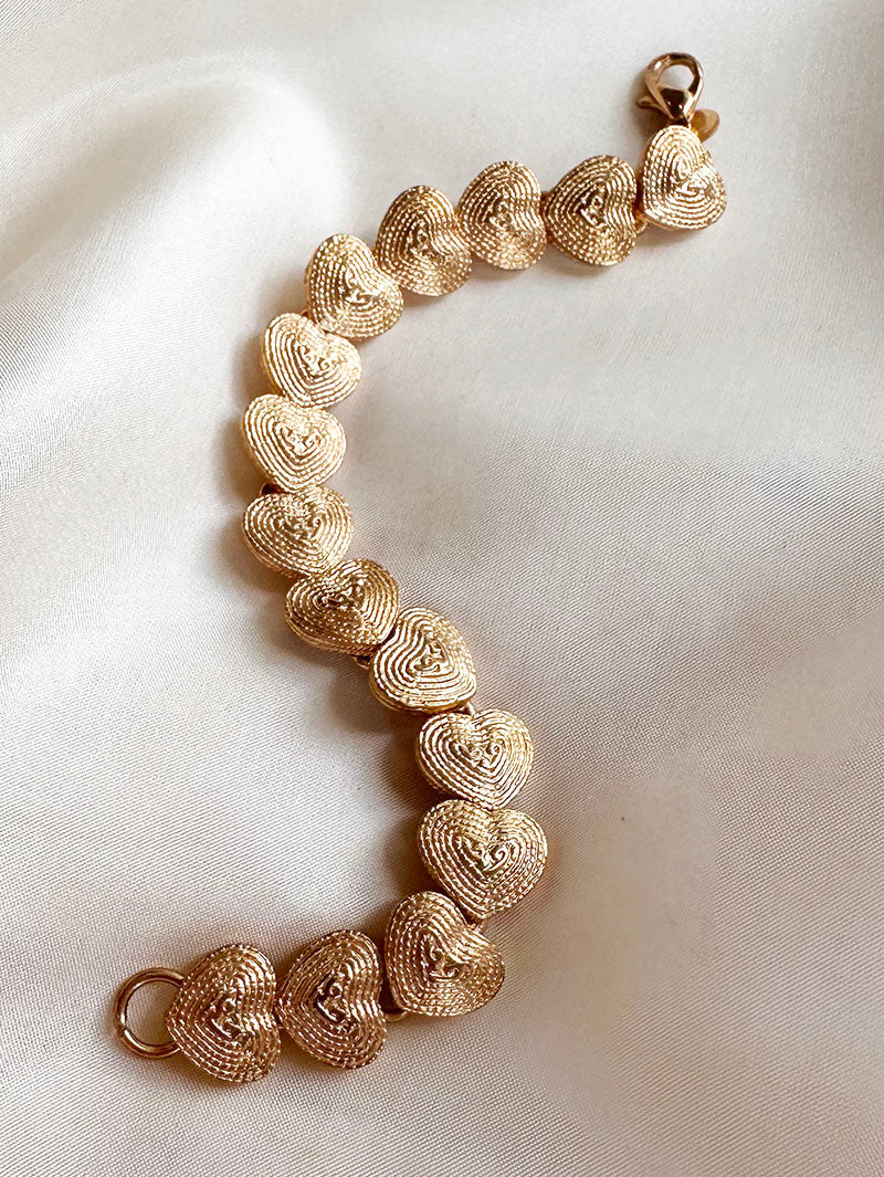 Gouden hartjes schakelarmband